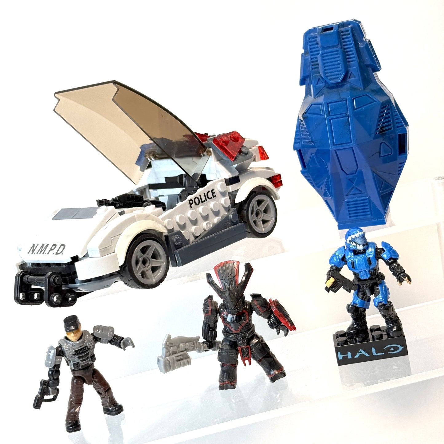 NEW MOMBASSA ASSAULT - NMPD Cruiser - Metallic Drop Pod - Halo Mega Bloks